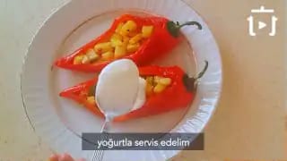 Kırmızı Kapya Biber Yatağında Karışık Kızartma Tarifi Nasıl Yapılır – videodan kare